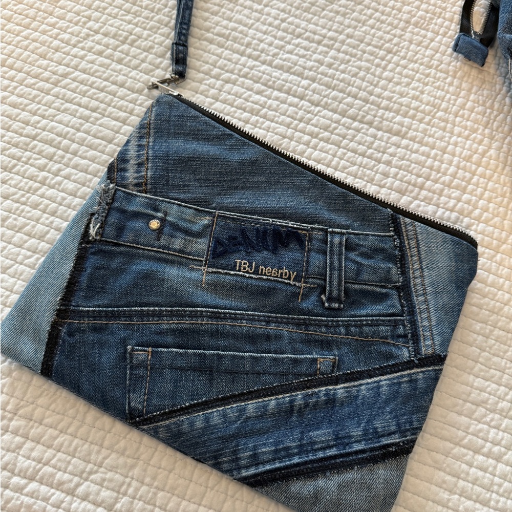 Rock ‘N Karma recycled denim clutch with pop art satin lining